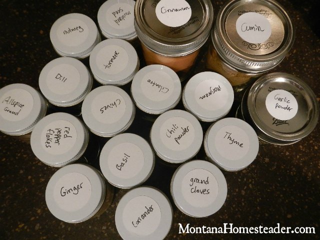 Spice storage jars with labels are a great way to organize a spice cupboard | Montana Homesteader